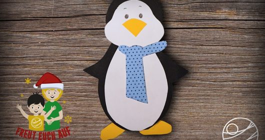 Fensterbild eines Pinguins aus Tonkarton