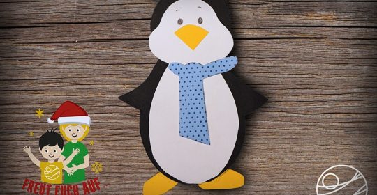 Fensterbild eines Pinguins aus Tonkarton